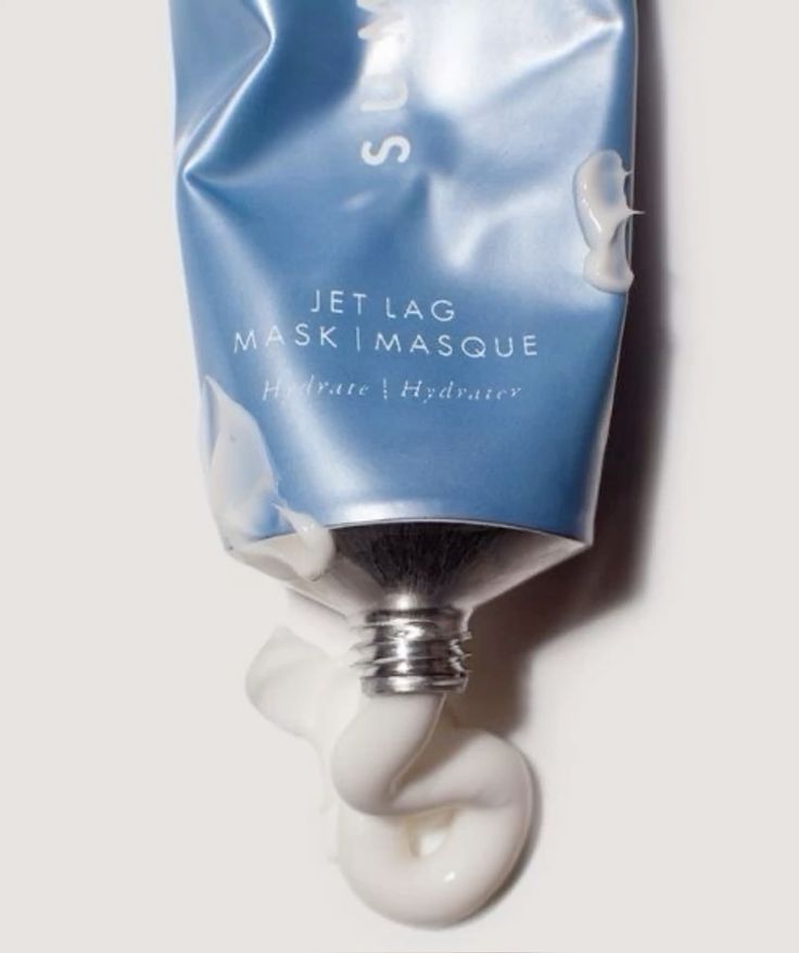 Blue mask tube with cream at the opening